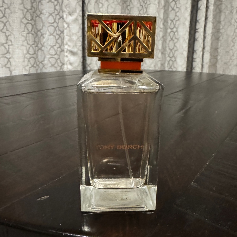 Tory Burch Clear Glass Decorative Bottle with Gold and Orange Cap